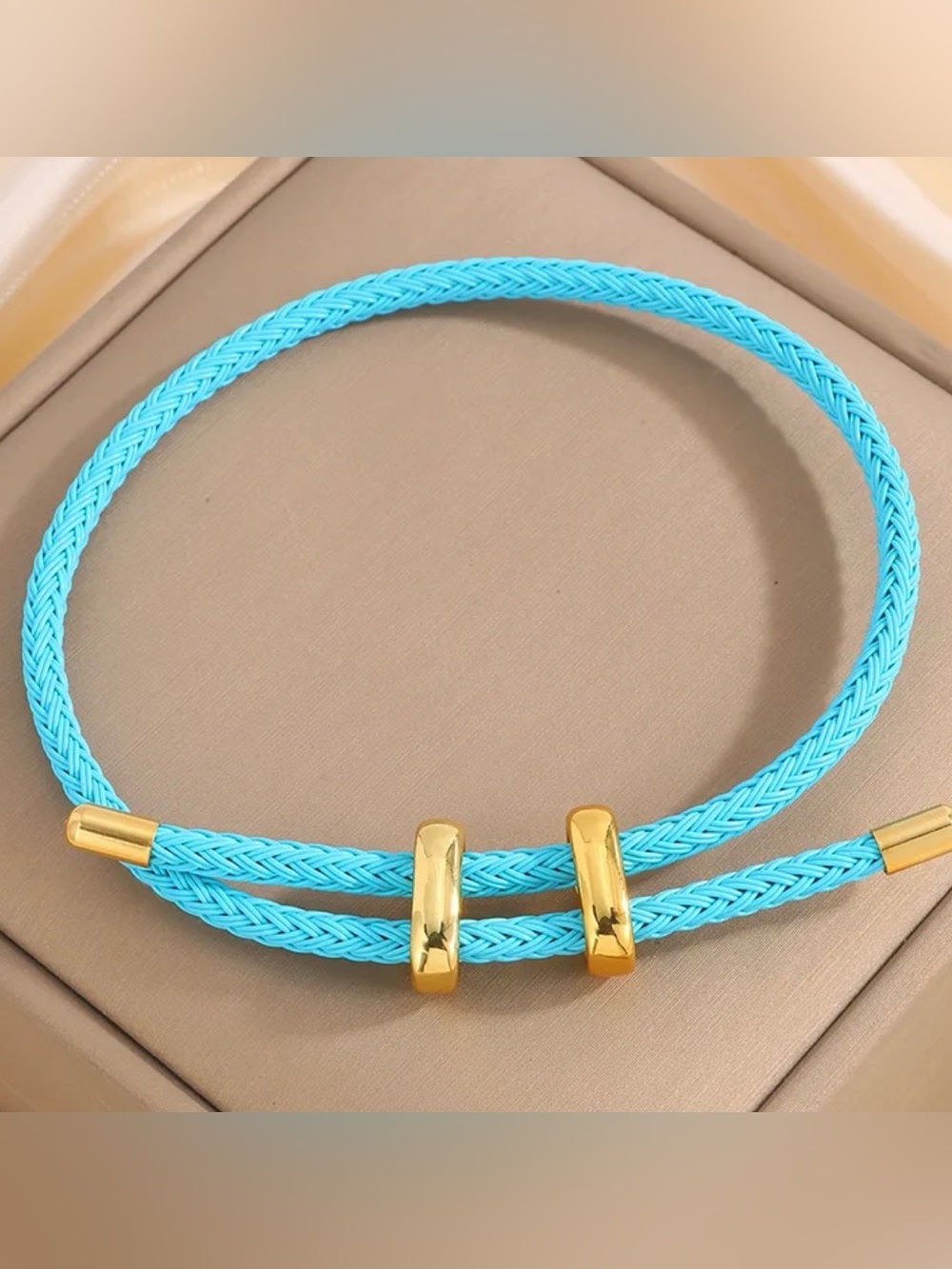 Luxe Turquoise Braided Cord Bracelet with Gold Double Bar Accent